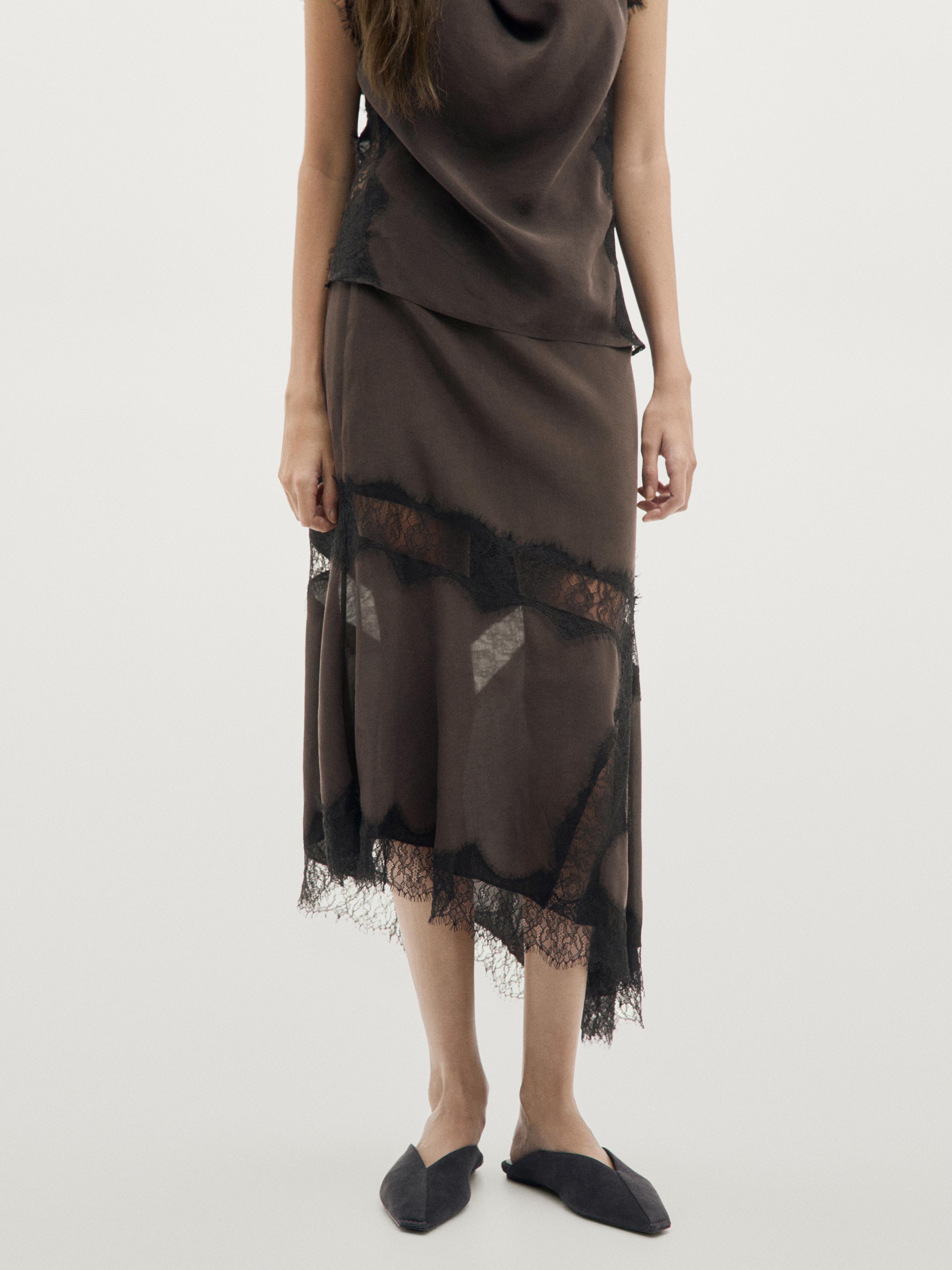 Flowing asymmetric midi skirt with lace detail